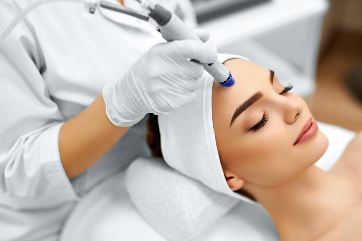 Woman getting a facial treatment.