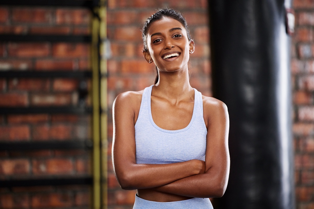 A young fit woman smiling